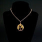An image of the November birthstone tree of life pendant from Uncorked & Bottled Up on a mannequin to show how the necklace is worn. Made with genuine citrine gemstones and copper wire